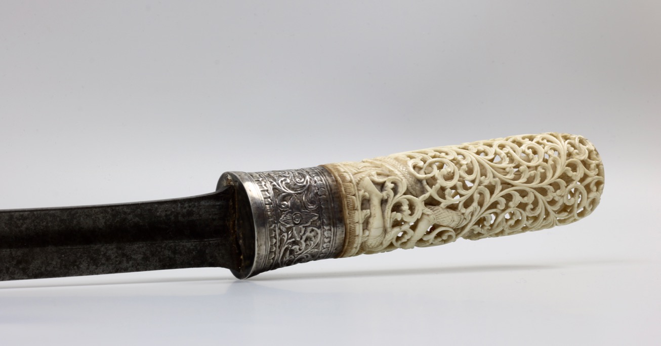 A Burmese dha with openwork ivory handle