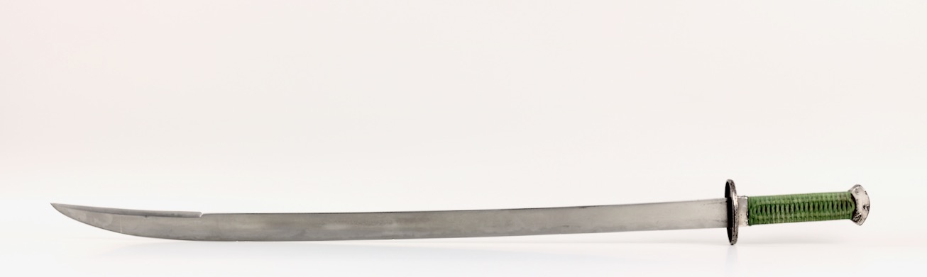 An antique Chinese saber of the 17th century with raised backedge.