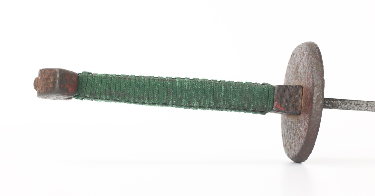 An antique Chinese saber of the 18th century with damascus blade and segmented grooves