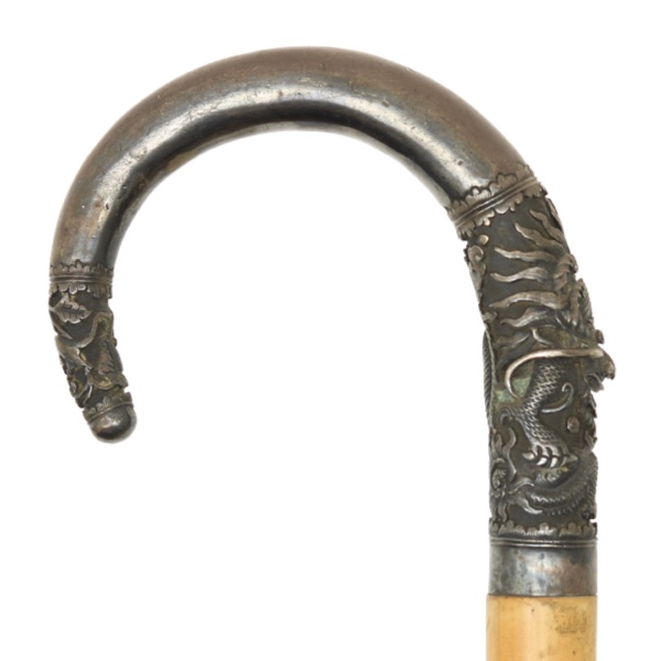 Vietnamese crook handle cane with silver handle logo