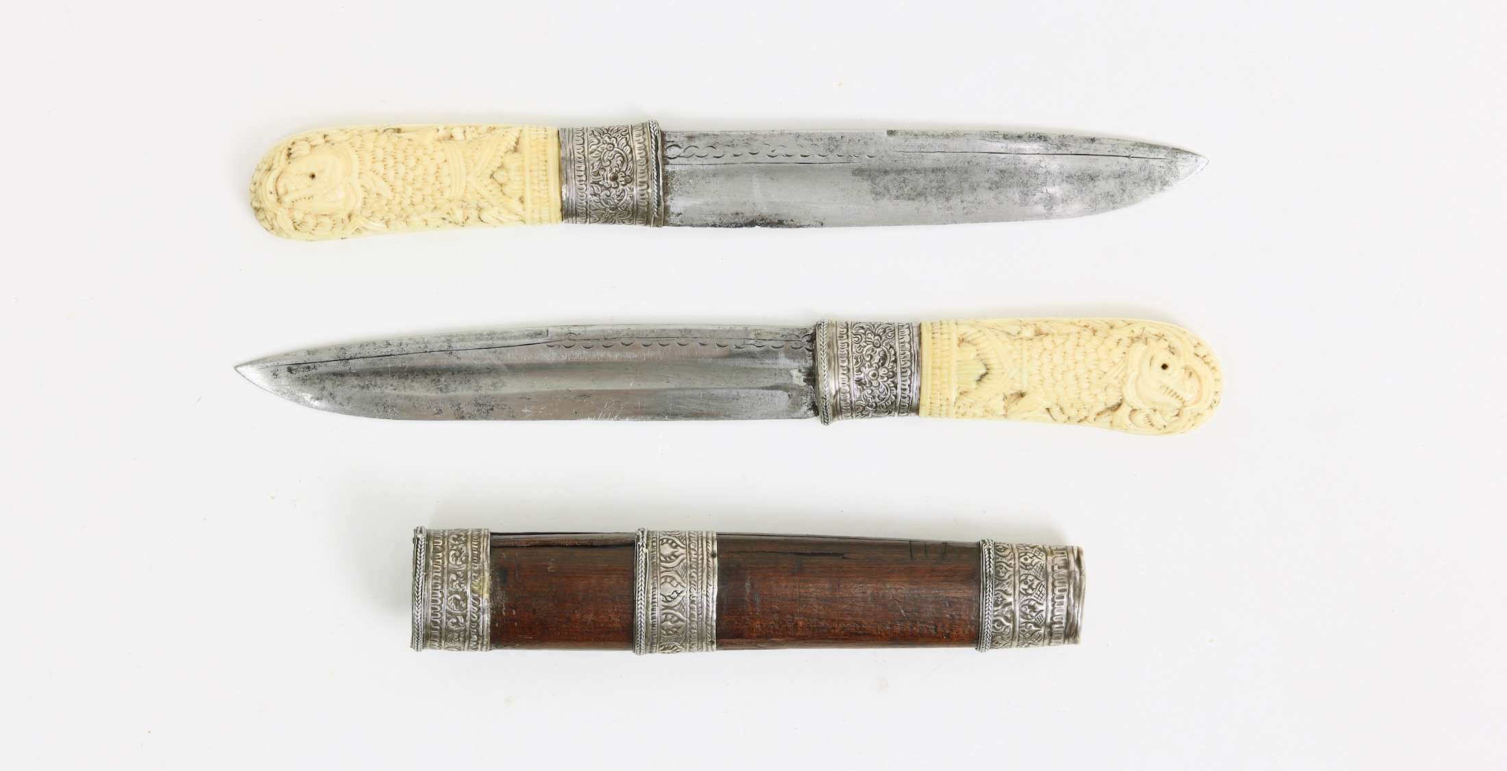 Double Burmese knives