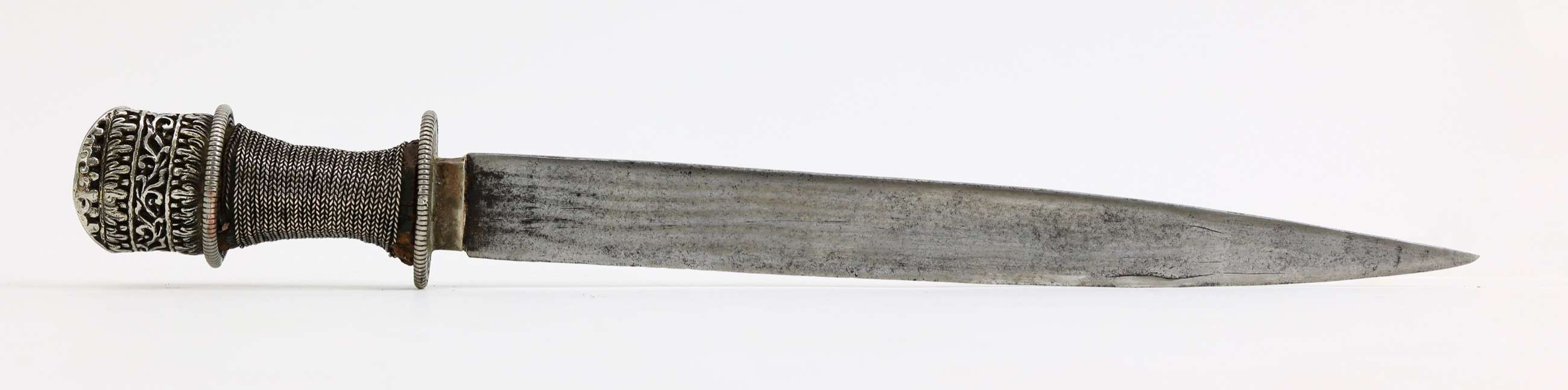 Fine Bhutanese silver pierced dagger also known as kongdi maja