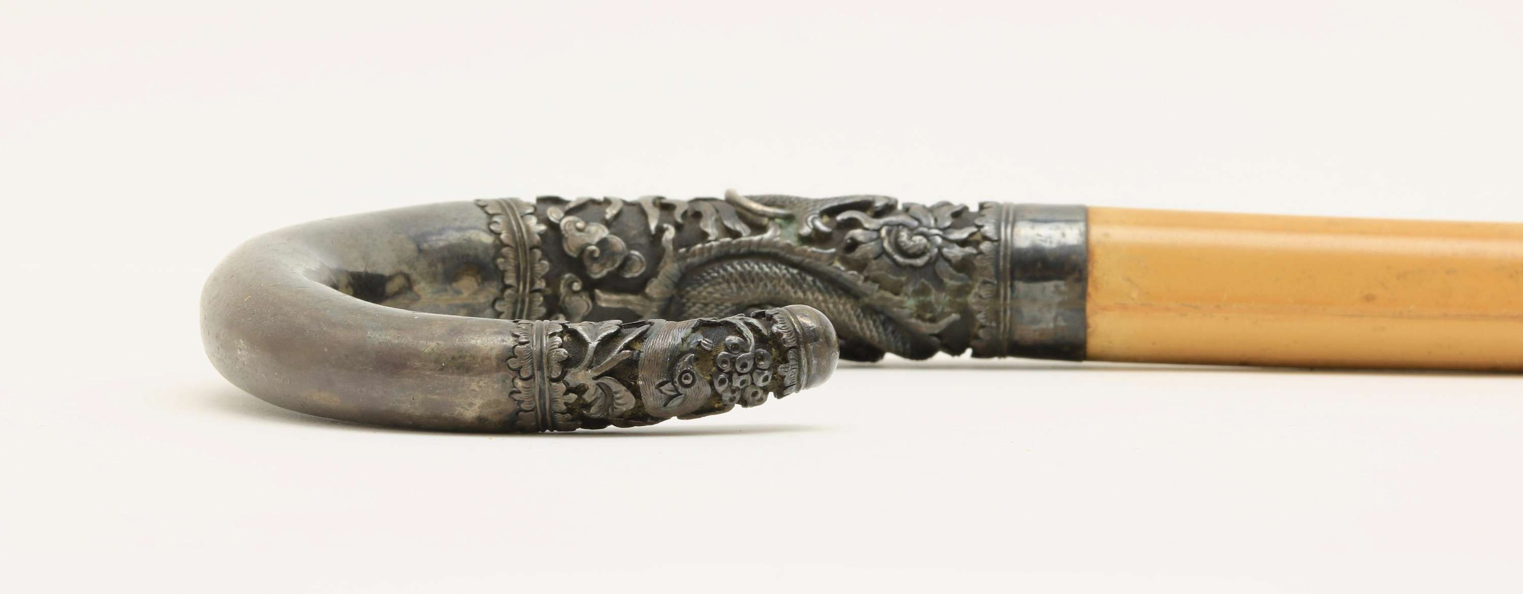 Vietnamese crook handle cane with silver handle