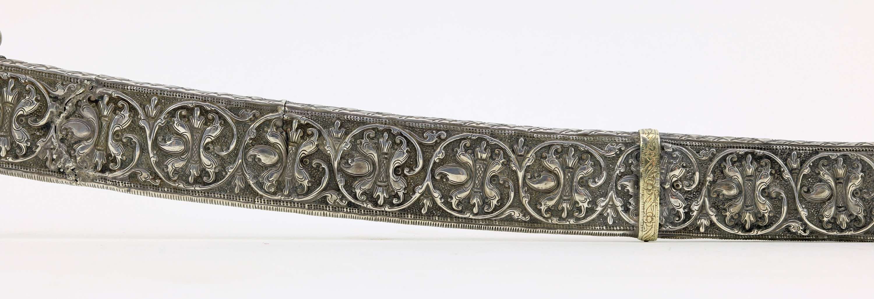 Fine Sinhalese kasthane with parcel gilding and silver repousse scabbard