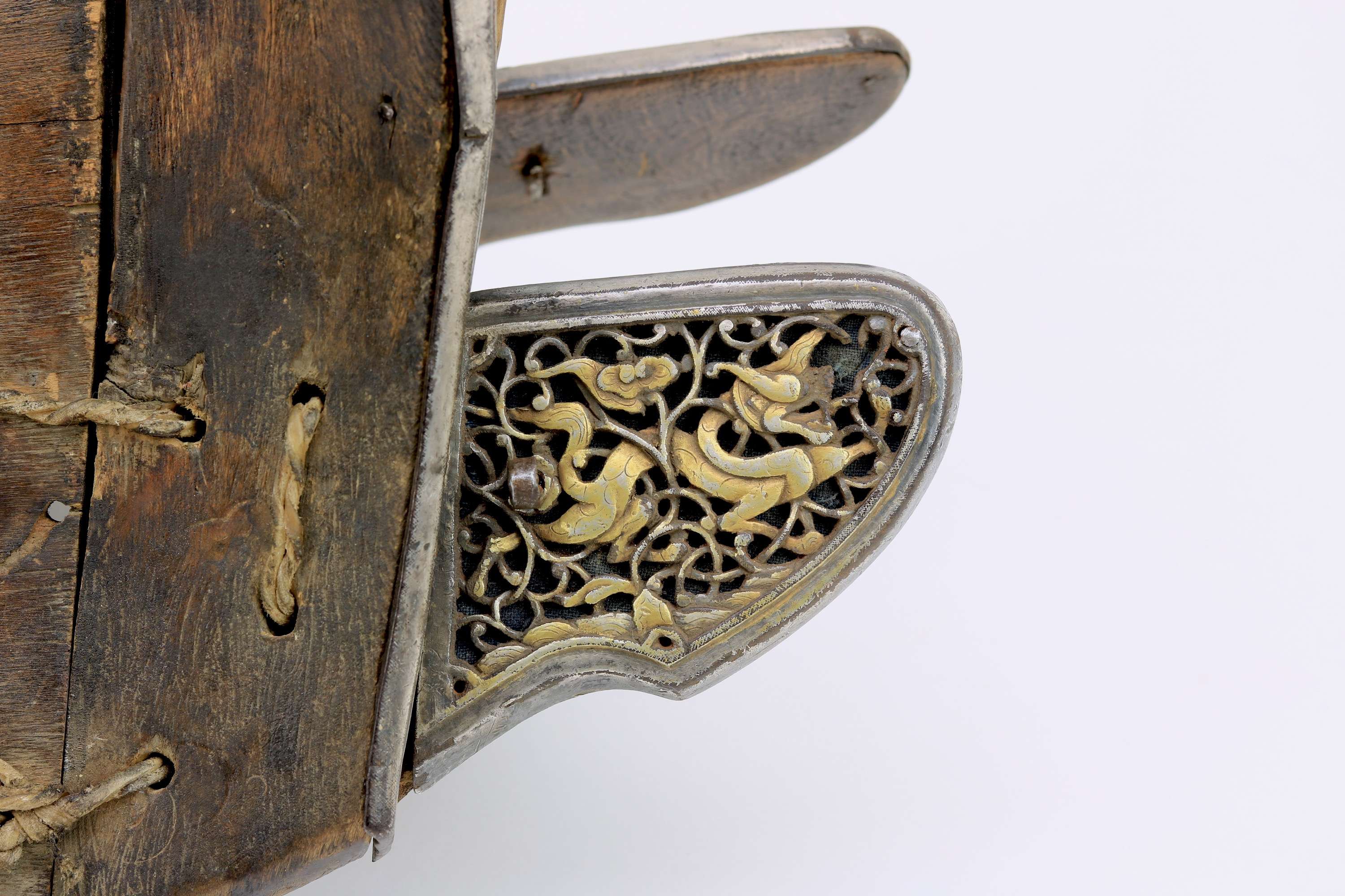 Pierced iron saddle